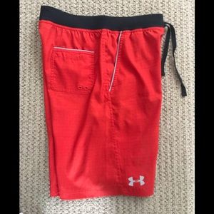 Red and Black under armor swim trunks